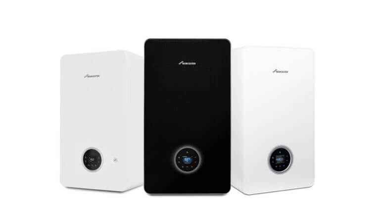 Three modern home heating boilers displayed side by side